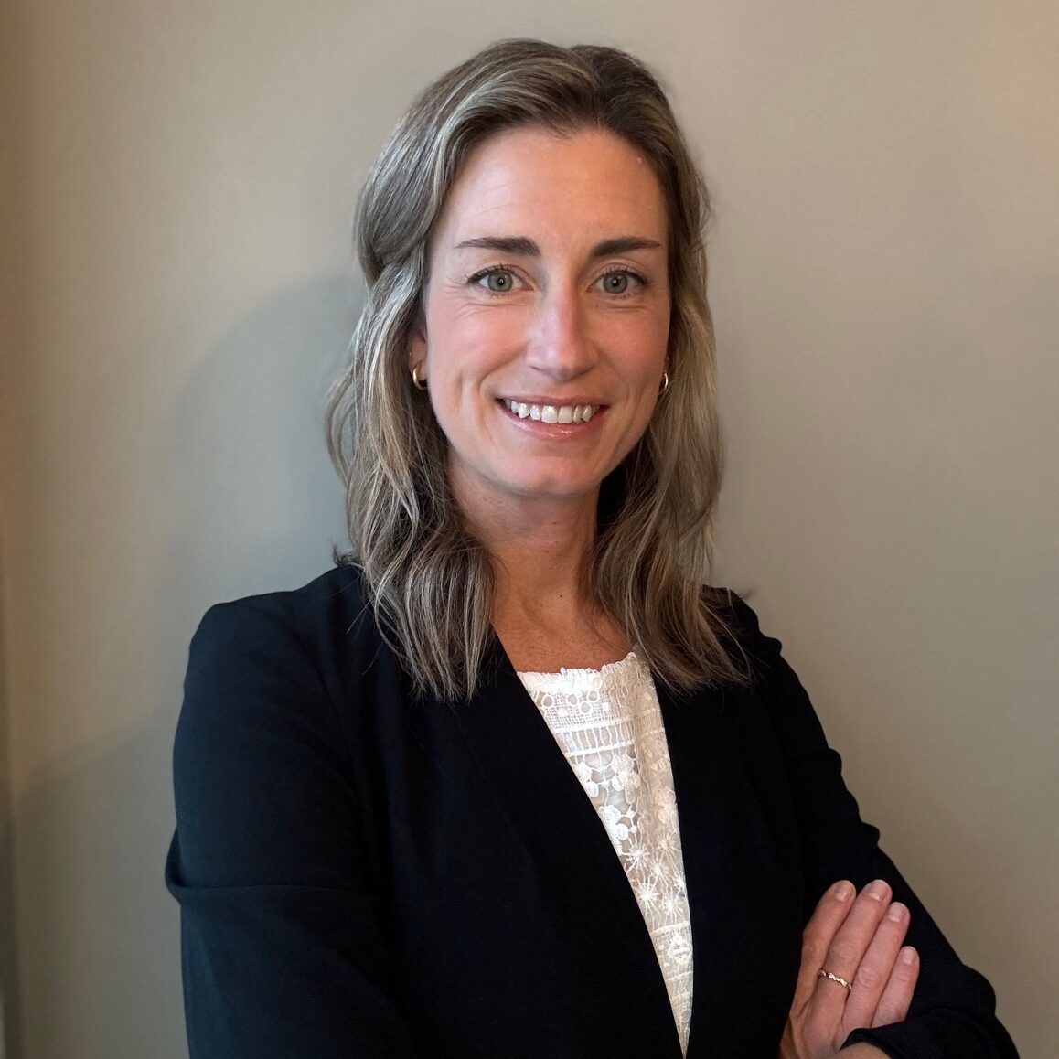 This image has an empty alt attribute, its filename is Erin-Alexander-headshot-e1762298247535.jpg