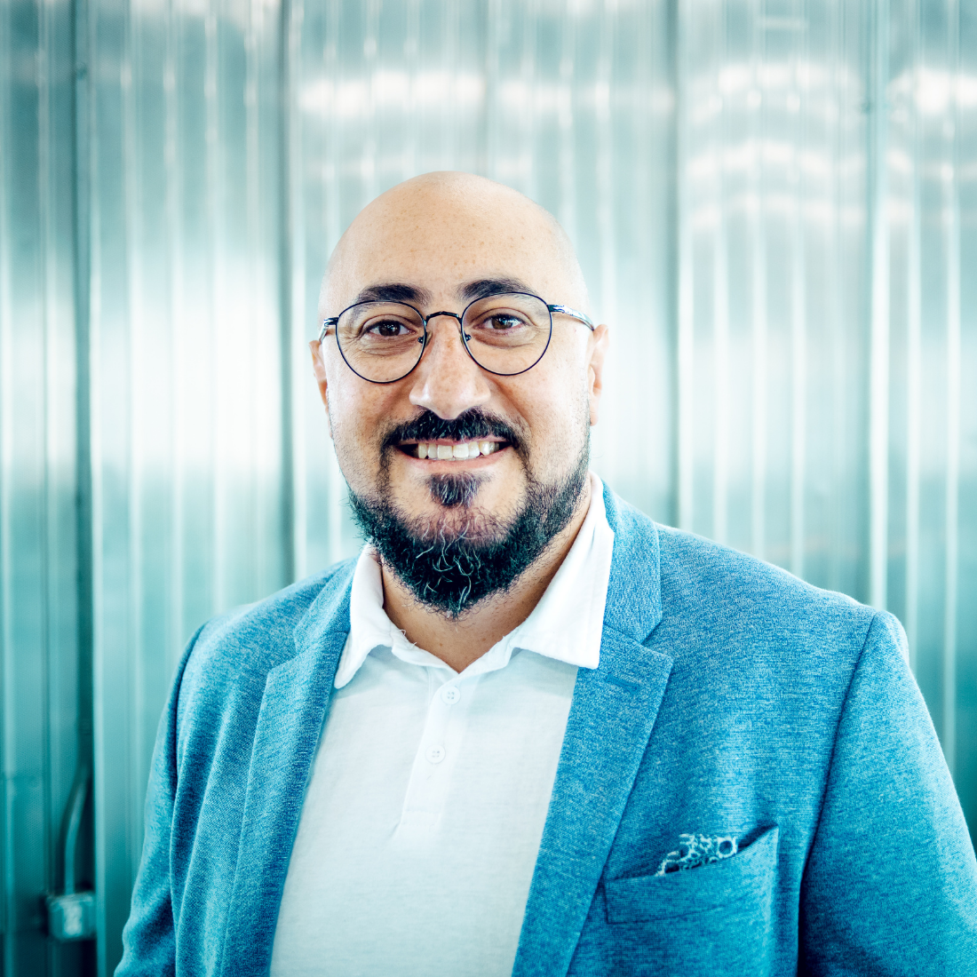 This image has an empty alt attribute, its filename is Mina-Demian-Square.png