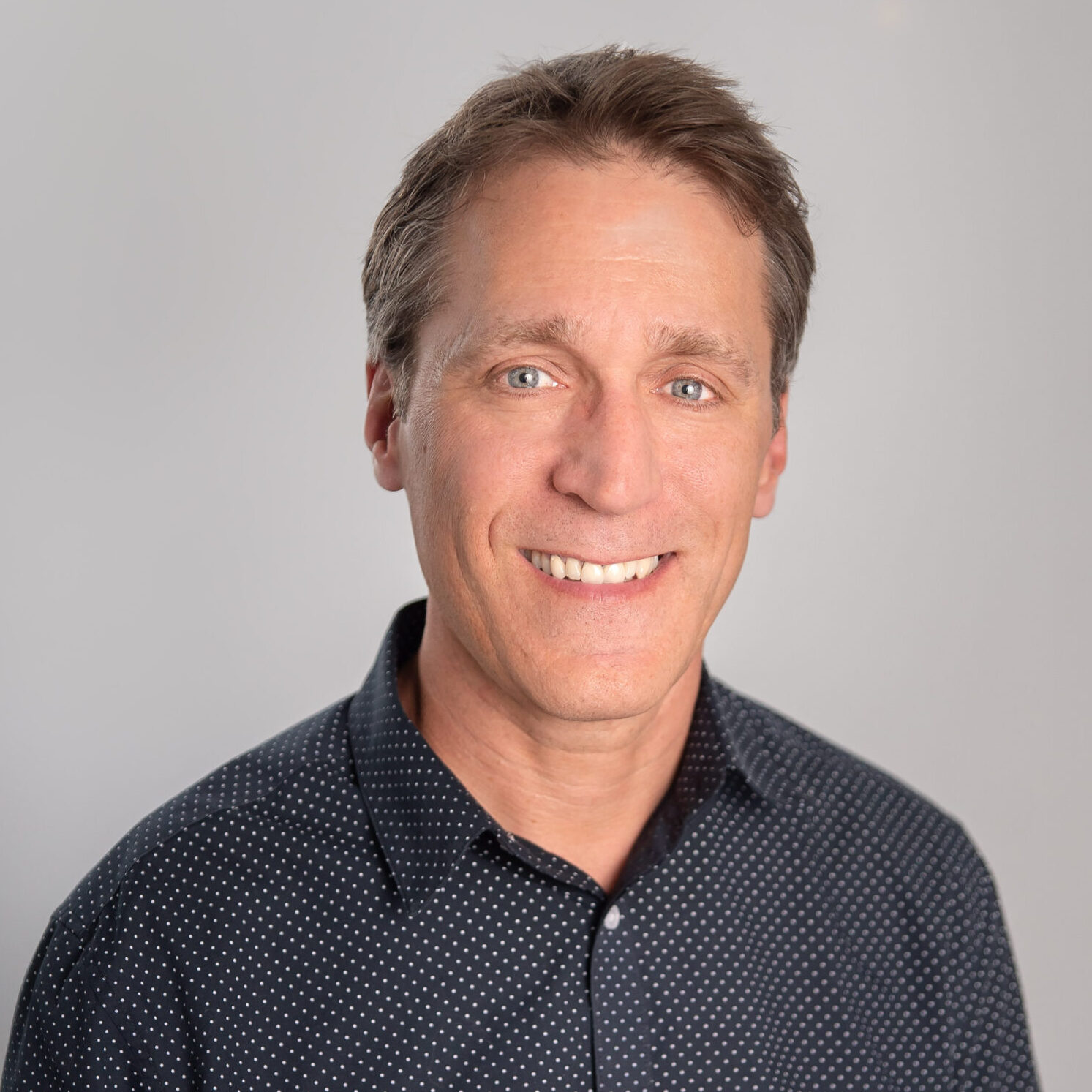 This image has an empty alt attribute, its filename is Aaron-McRann-scaled-e1765399882104.jpg