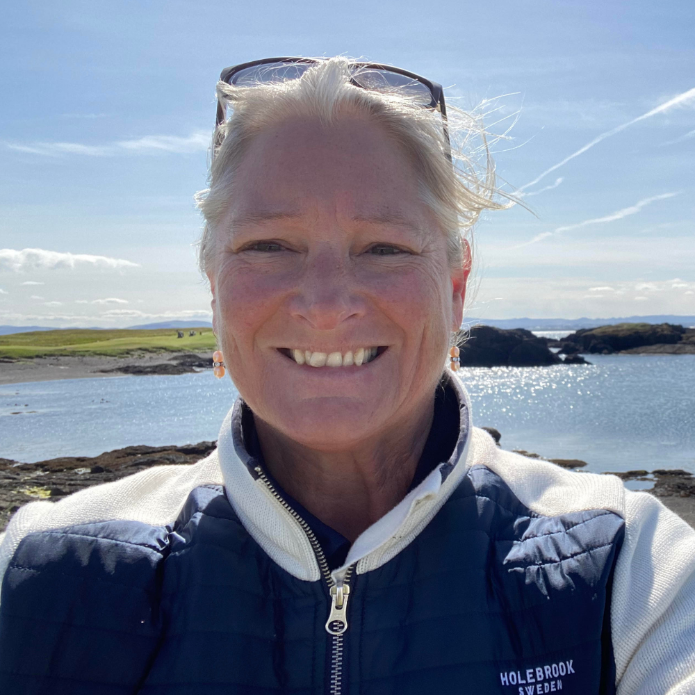 This image has an empty alt attribute, its filename is Margery-Moore.png